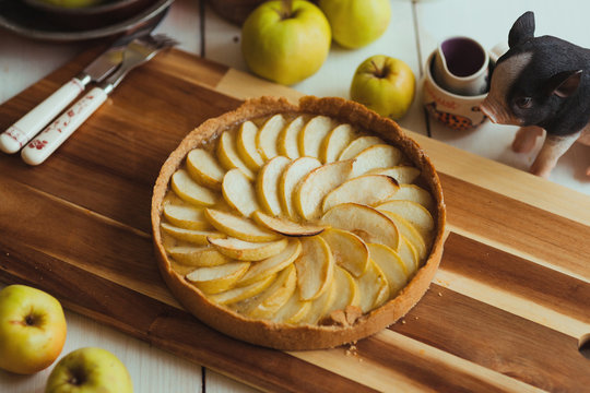 French apple pie on a large wooden board