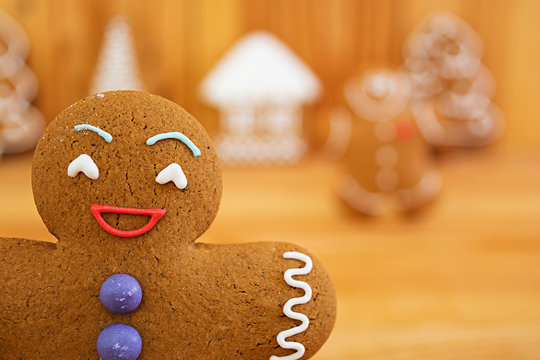 Christmas gingerbread cookies on wooden background