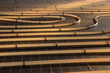 Construction of house. Tubing are elements of radiant floor heating system