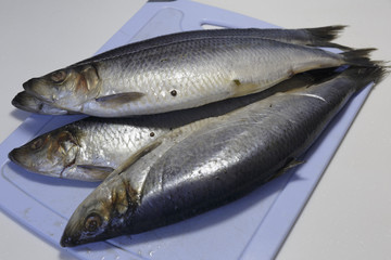 Salted Herring on a cutting Board