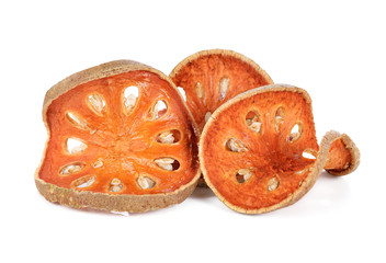 Aegle marmelos. Dry bael fruit on white background