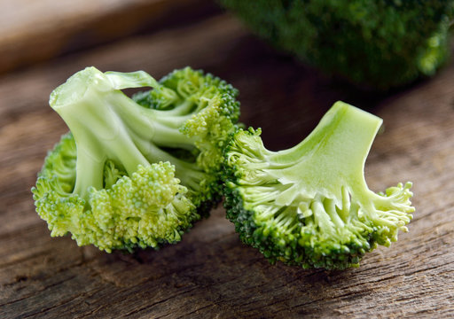 fresh green broccoli on wooden background
