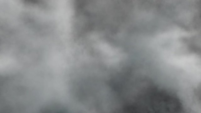Middle size smoke explosion with trails, explodes on camera. Smoke density - low. Separated on pure black background, contains alpha channel.