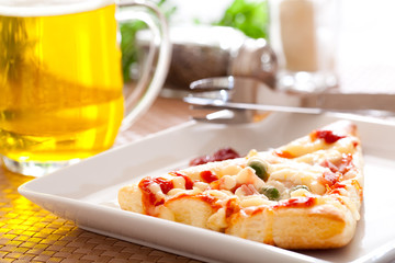 Pizza with beer