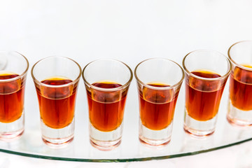 Catering services. Celebration. glasses red alcohol placed on the glass