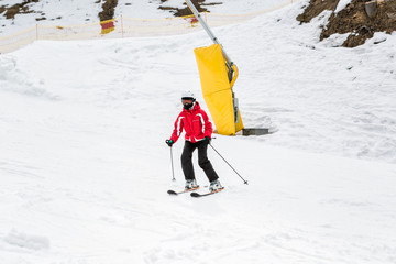 skier is skiing down the slope