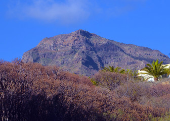 View of Roque del Conde mount (Table Mountain) in Torviscas Alto,Tenerife,Canary Islands,Spain.Vacation or travel concept.Selective focus.