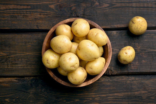 Young raw potatoes in bowl