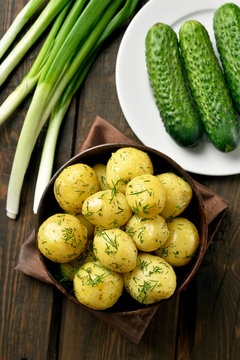 Young boiled potatoes with dill