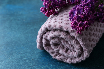 setting with flowers and towel