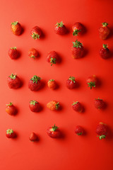 Strawberry on red background