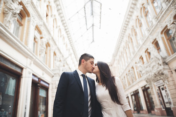 Loving couple posing in the old town