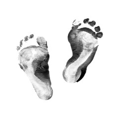 Baby footprints isolated. Fingerprint or stamp texture artwork of kids. Top view. Black and white colors. Close up.