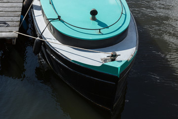 Turquoise sunny boat