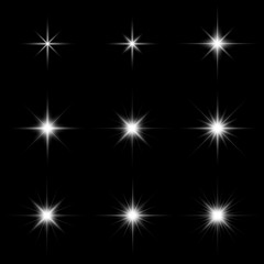 Set of glare lighting, twinkle lens flares and stars burst with sparkles on black background vector illustration