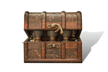 Bottles of tincture or potion in a retro styled old treasure chest on white background isolated