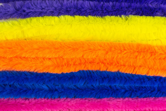 background of multicolored pipe cleaners