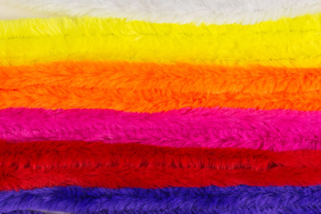 background of multicolored pipe cleaners