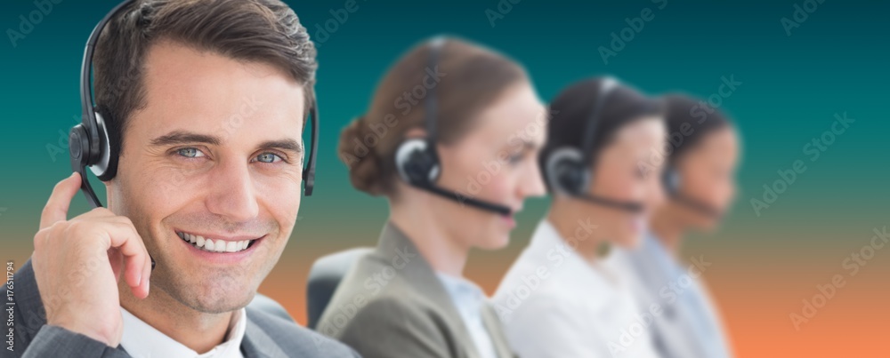 Canvas Prints Composite image of business people with headsets using computers