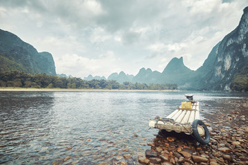 Retro toned picture of a bamboo raft on Li River, Xingping, China.