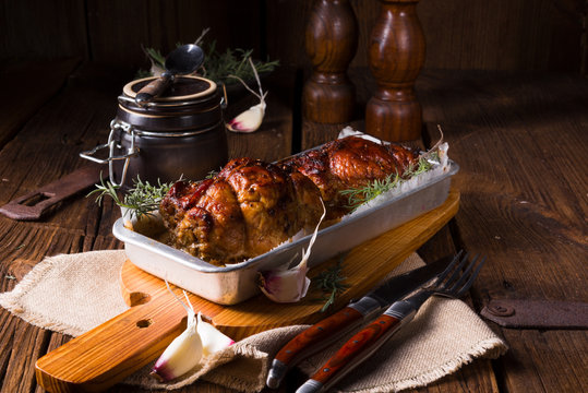 small Rolling roasts fully with dried fruit and bacon