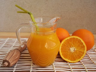 Freshly squeezed orange juice in the pitcher.