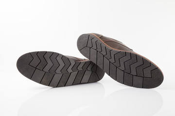 Male brown leather sandal on white background, isolated product, comfortable footwear.