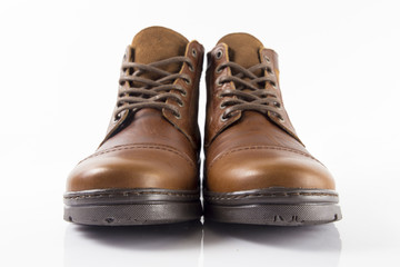 Male brown leather boot on white background, isolated product.