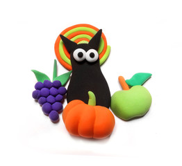 Halloween. Funny cat. Made in modeling techniques from plasticine