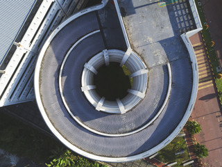 A spiral design or car park for easy access in and out each parking floor.