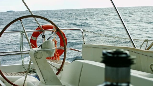 Sailor's point of view. Sailboat floating on an open sea