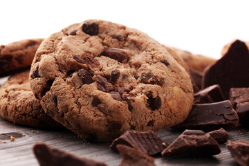 Chocolate cookies on wooden table. Chocolate chip cookies shot.