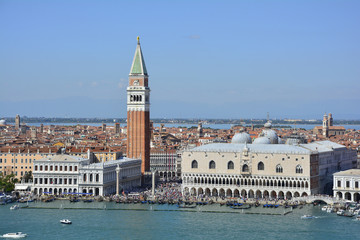 Fototapeta na wymiar A view of Venice taken from the San Giorgio Maggiore with the iconic Campanile di San Marco (Saint Mark's Belltower) and the Doge's Palace 