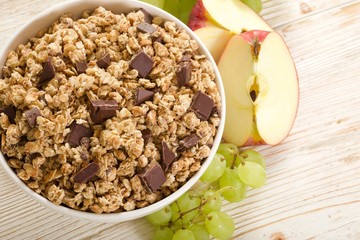 muesli chocolate on a wooden background