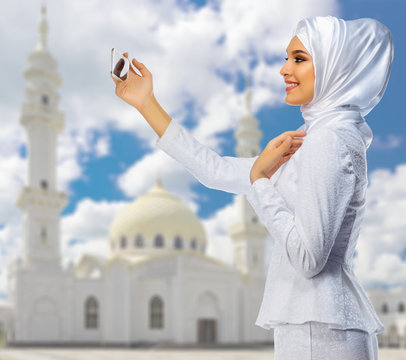 Young muslim girl at mosque background