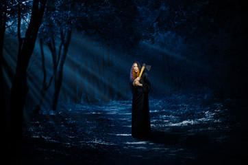 Witch in night forest