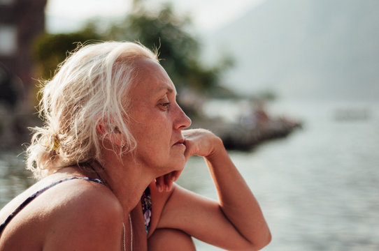 Woman having a rest by the sea shore