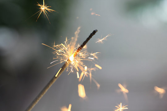 Close up of burning Sparkler on 4th of July
