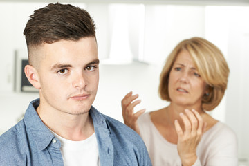 Mother Arguing With Teenage Son At Home