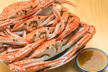 Flower crab group steamed on wood background