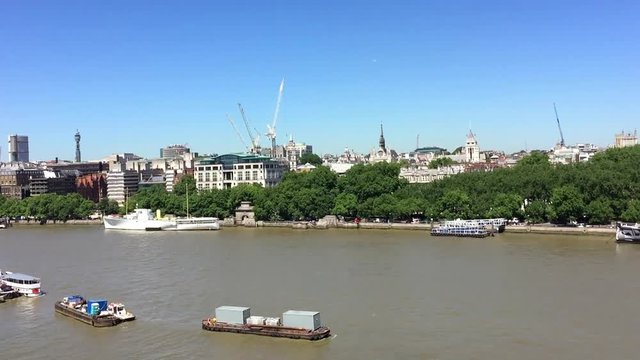 London buildings over Thames river.
