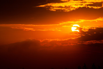 sun ray is go down and amazing dramatic  orange cloud, twilight sky