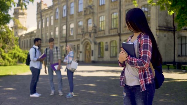 Asian exchange student suffering lack of friends at foreign university, lonely