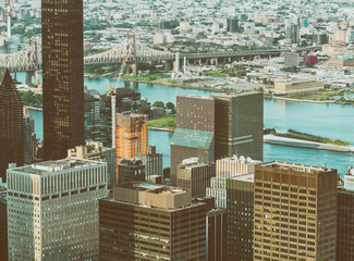NEW YORK CITY - JUNE 9, 2013: Aerial view of Midtown skyscrapers. New York attracts 50 million tourists every year