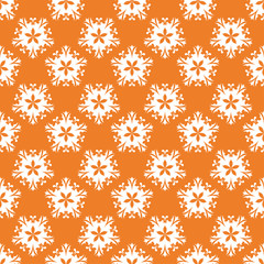 White floral ornament on orange. Seamless pattern