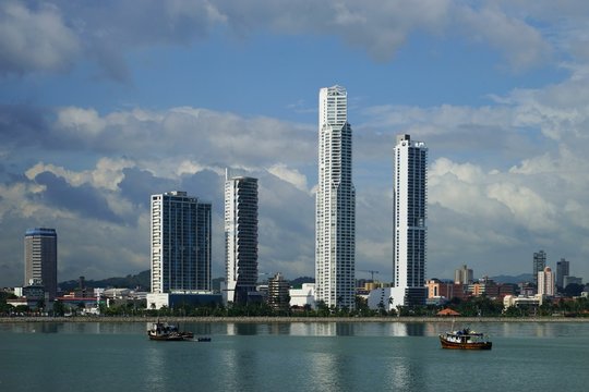 Day view of Panama City Over Panama Bay with fishing boats on the foreground