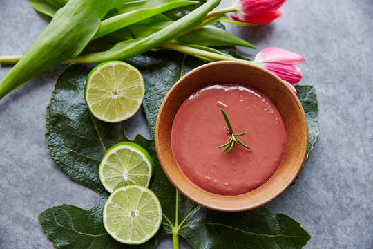 Spa still life of pomegranate mud and lime treatment