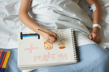 Child patient making a draw in the hospital room