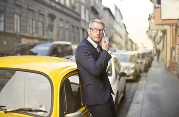 Young businessman doing a phone call