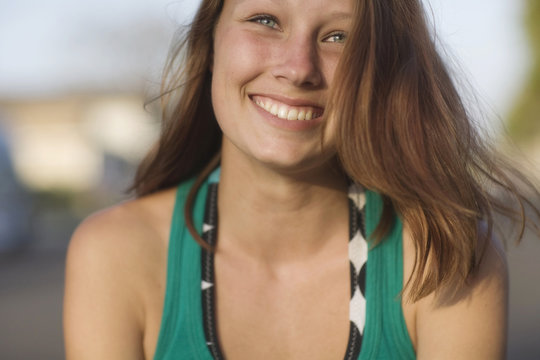 Beautiful Brunette Teen Smiling and Laughing